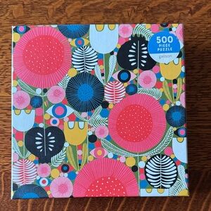 500 piece “Eyes in the Garden” jigsaw puzzle by Galison